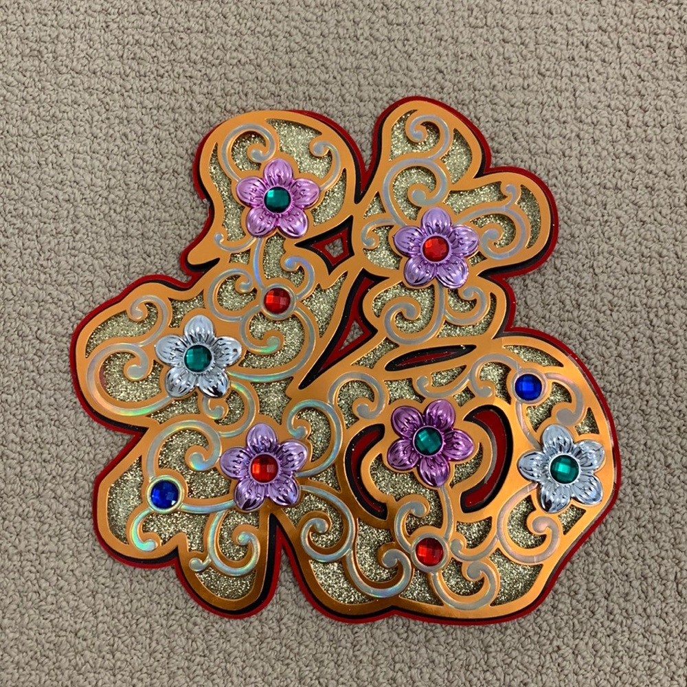 Chinese wall decorations. Laser cut paper cutout of the word Happiness